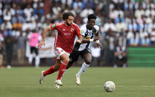 Fily Traore of TP Mazembe challenges Mohamed Hany of Al Ahly during the CAF Champions League 2023/24 1st leg semifinal match between TP Mazembe and Al Ahly at Stade TP Mazembe in Lubumbashi, DRC on 20 April 2024 ©BackpagePix