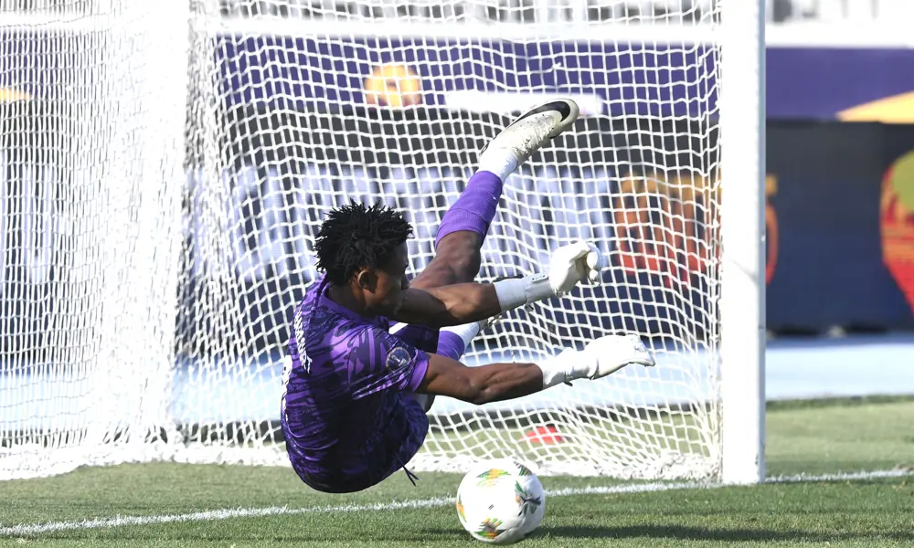 Ebenezer Ifeanyi Harcourt of Nigeria saves a penalty during the 2025 Africa Cup of Nations U20 Quarter Final match between Nigeria and Senegal