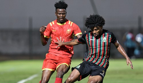 To Carneiro of FAR Rabat challenges Mubark Abdalla Ahmed Abdalla of Al-Merrikh during the CAF Champions League 2024/25 Preliminary Round 2nd Leg match between FAR Rabat and Al-Merreikh